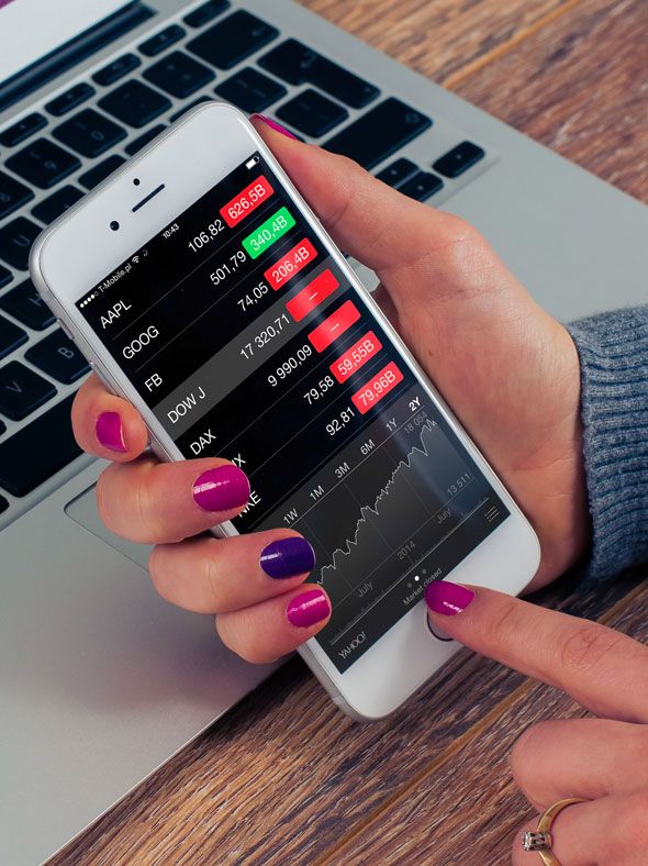 Person Checking Stock Market on Mobile